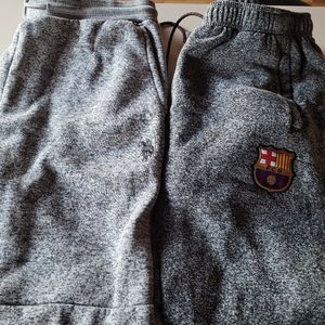 2 pairs of men's size medium  sweats , tapered at legPolo association and FBC